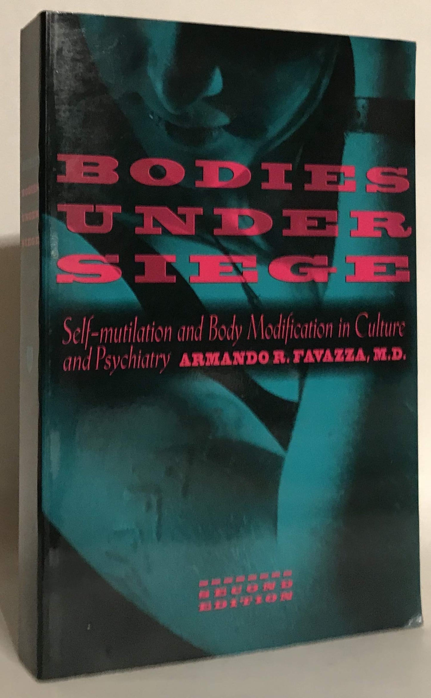 Bodies under Siege: Self-mutilation and Body Modification in Culture and Psychiatry