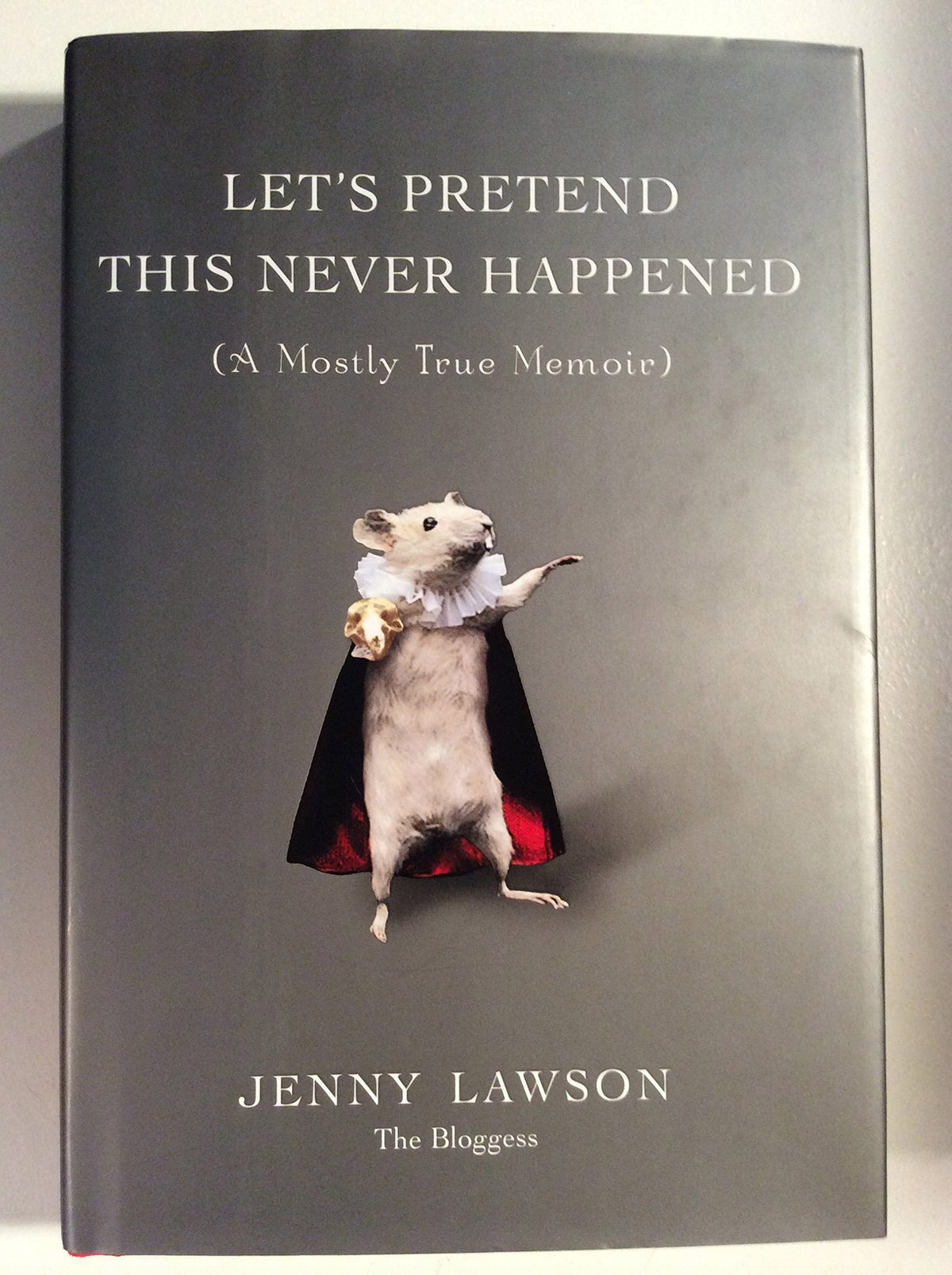 Lets Pretend This Never Happened: (A Mostly True Memoir)