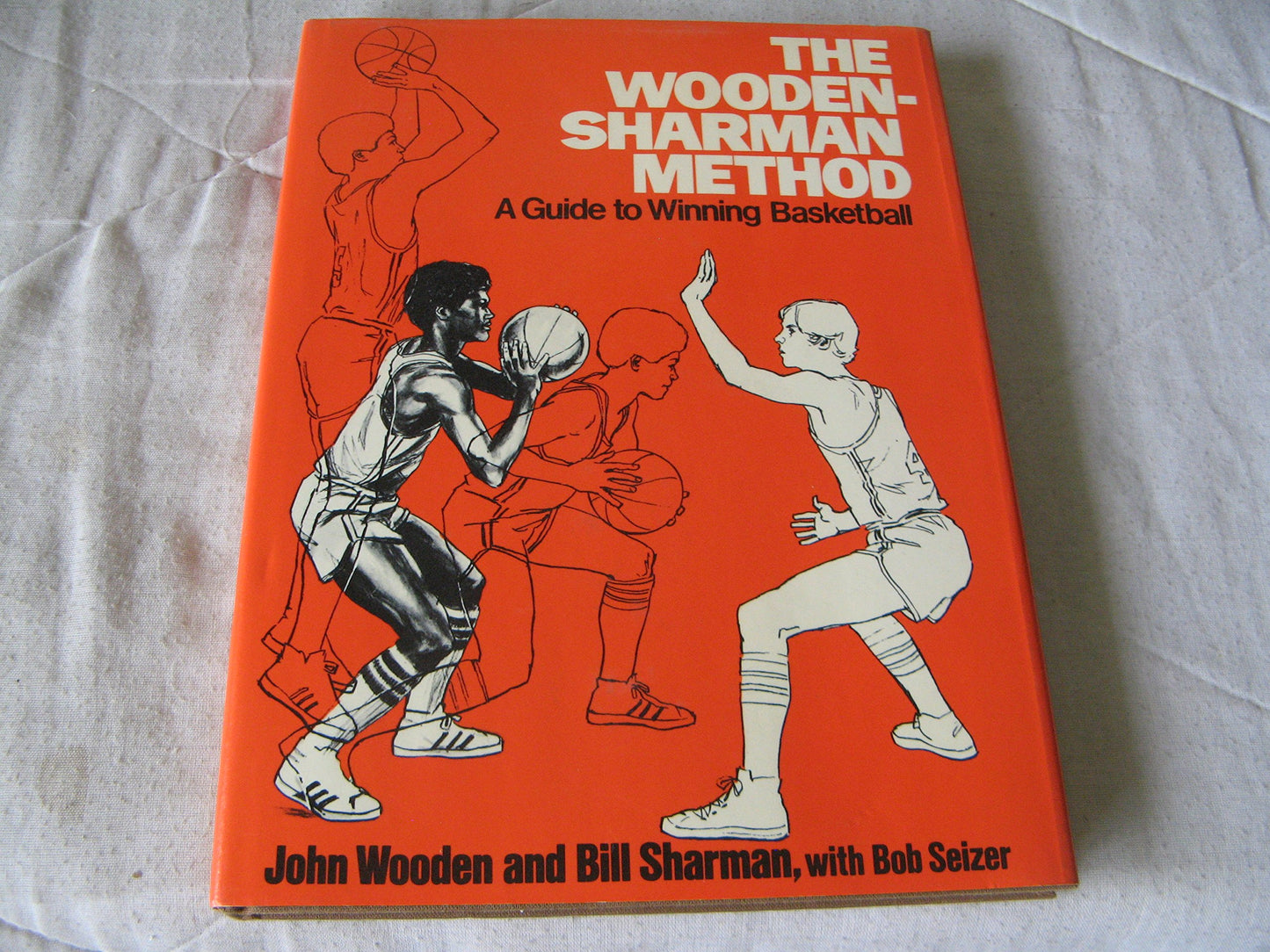 The Wooden-Sharman Method: A Guide To Winning Basketball by