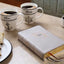 NIV, Couples' Devotional Bible (Build a Biblical Foundation for Your Marriage), Leathersoft, Stone, Comfort Print: Growing Together in Christ