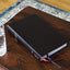 NIV, Thinline Reference Bible (Deep Study at a Portable Size), Bonded Leather, Black, Red Letter, Thumb Indexed, Comfort Print