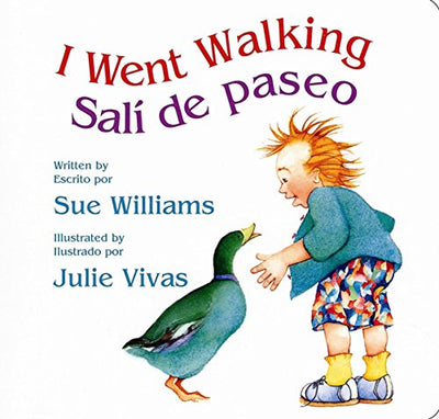 I Went Walking/Salí de paseo: Lap-Sized Board Book (Spanish and English Edition)