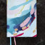 The Jesus Bible Artist Edition, NIV, (With Thumb Tabs to Help Locate the Books of the Bible), Leathersoft, Multi-color/Teal, Thumb Indexed, Comfort Print