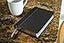 NIV, Compact Center-Column Reference Bible, Leathersoft, Black, Red Letter, Comfort Print