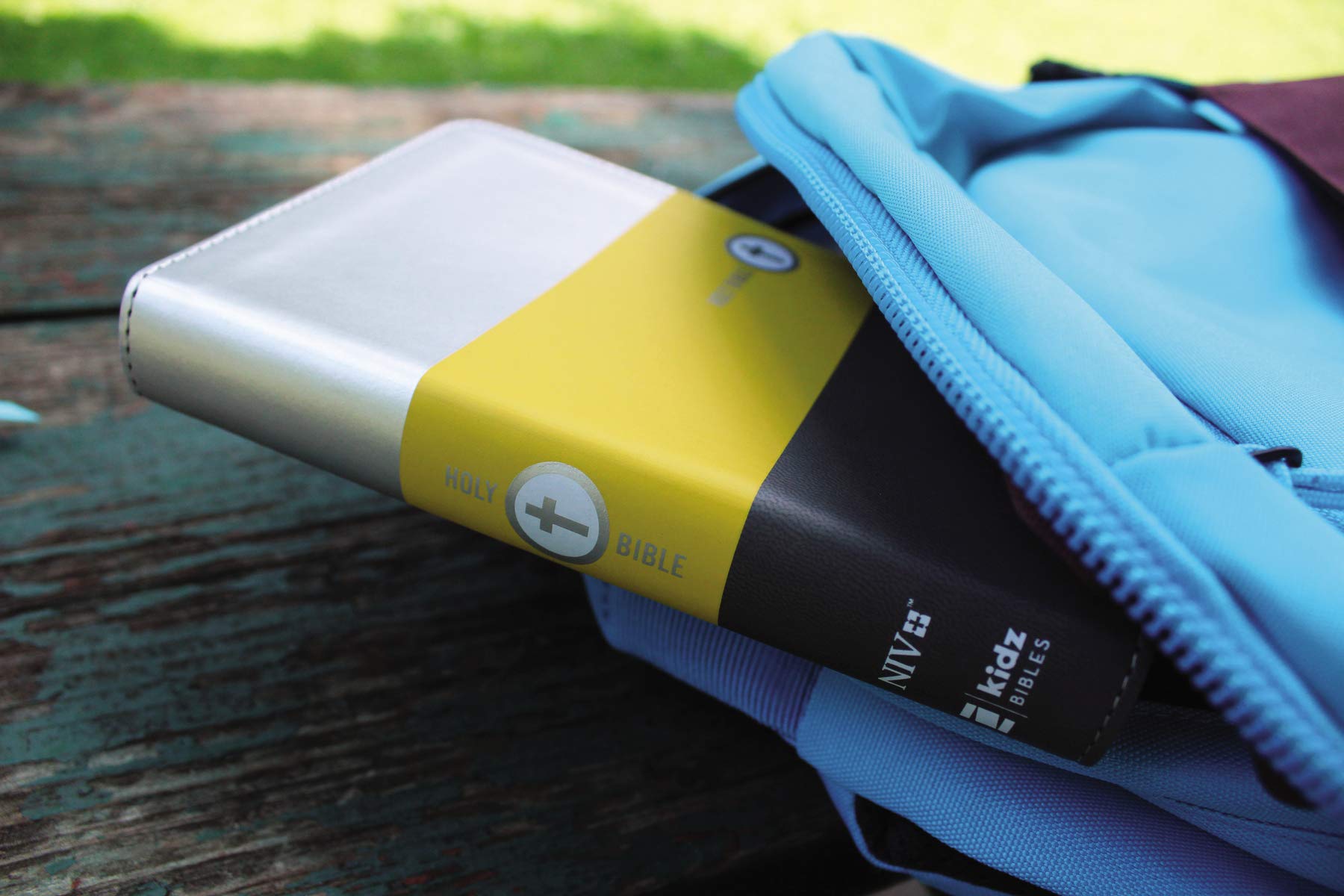 NIV, Boys' Backpack Bible, Compact, Leathersoft, Yellow/Gray, Red Letter, Comfort Print: A Portable, Durable, and Easy-to-Read Bible that Goes Everywhere