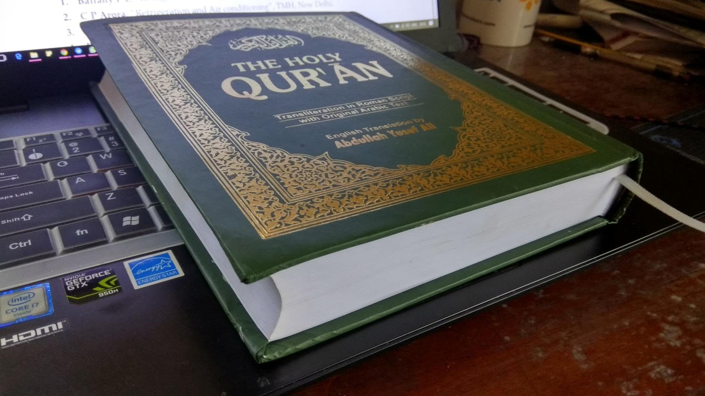 The Holy Qur'an: Roman Transliteration, with orginal Arabic Text and English translation