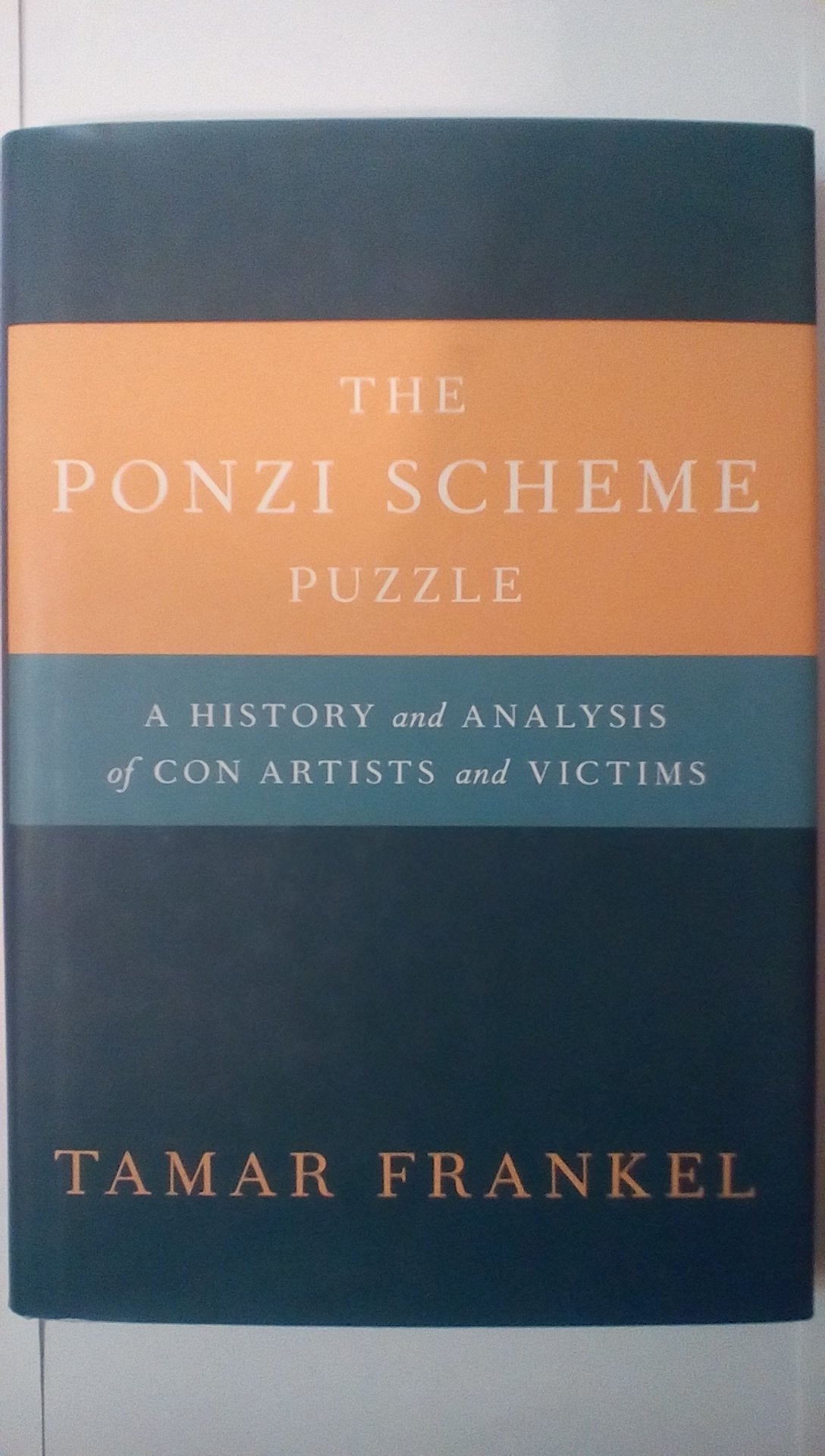 The Ponzi Scheme Puzzle: A History and Analysis of Con Artis