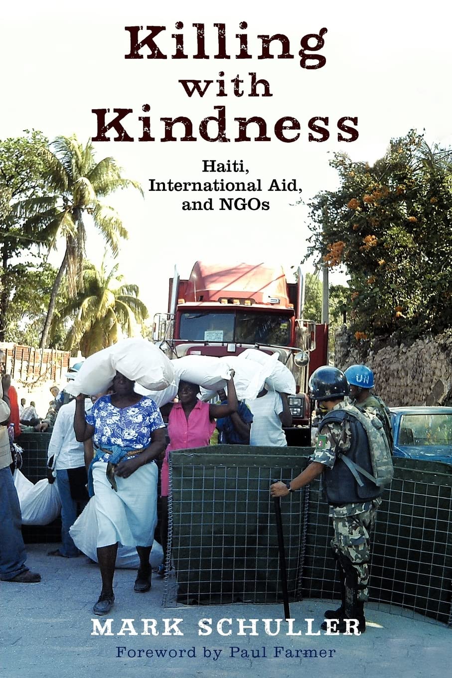 Killing with Kindness: Haiti, International Aid, and NGOs by