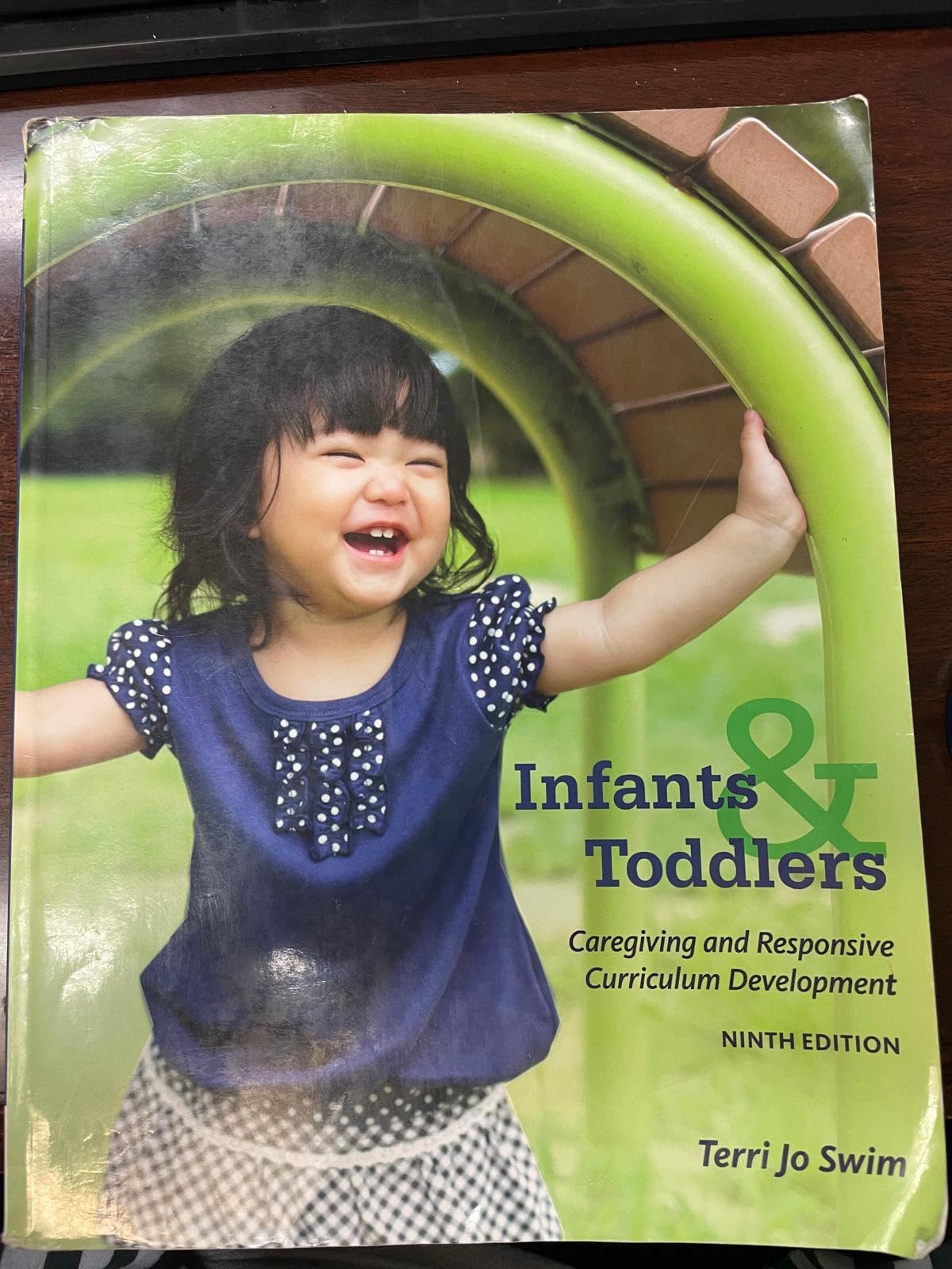 Infants, Toddlers, and Caregivers: Caregiving and Responsive Curriculum Development