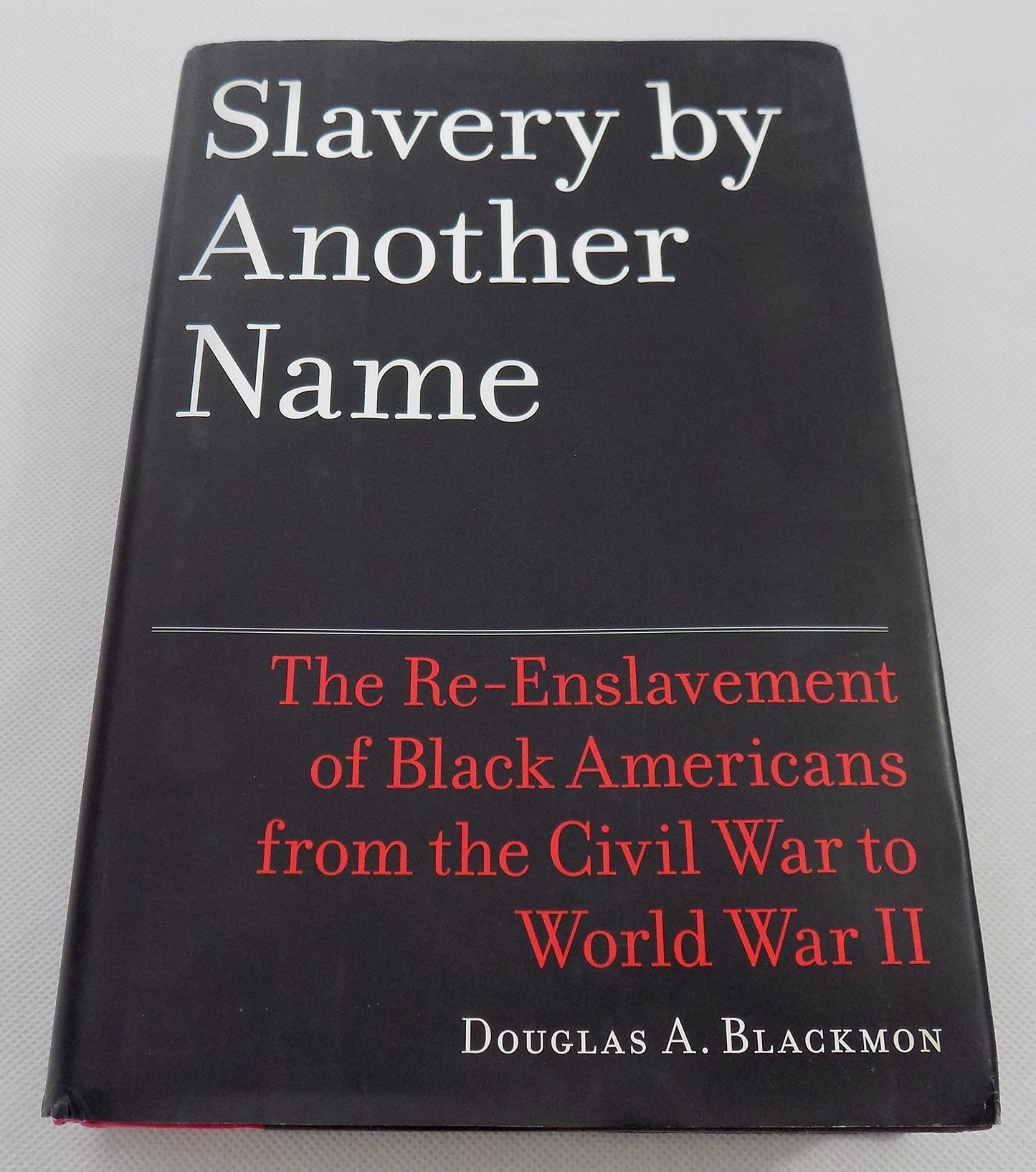 Slavery by Another Name: The Re-Enslavement of Black America