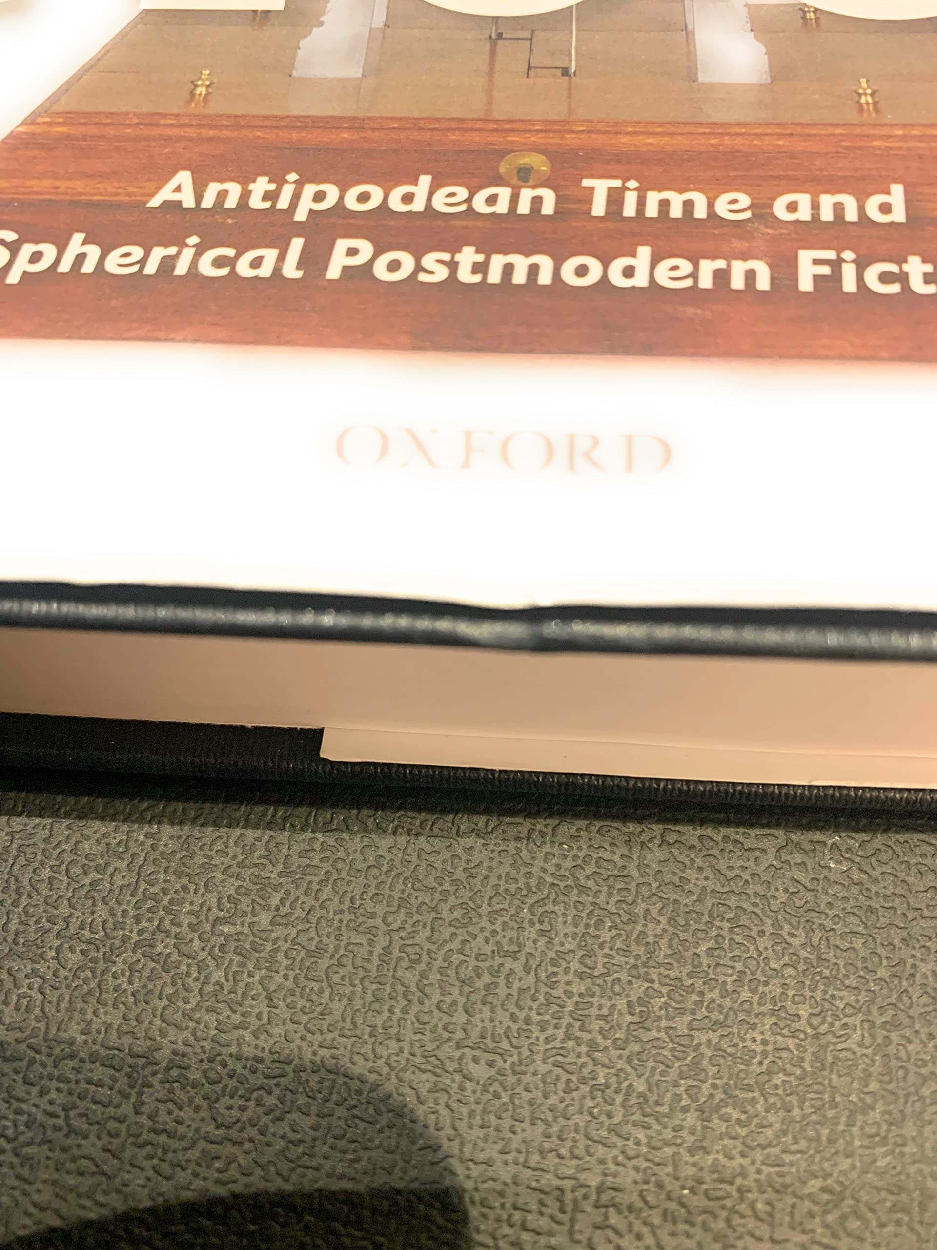 The Planetary Clock: Antipodean Time and Spherical Postmodern Fictions
