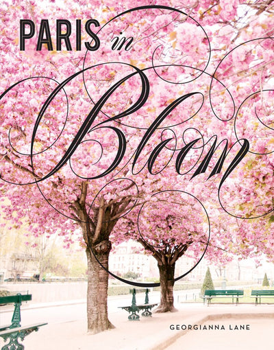 Paris in Bloom: Parisian floral photography pairing iconic landmarks with cascades of roses and cherry blossoms.