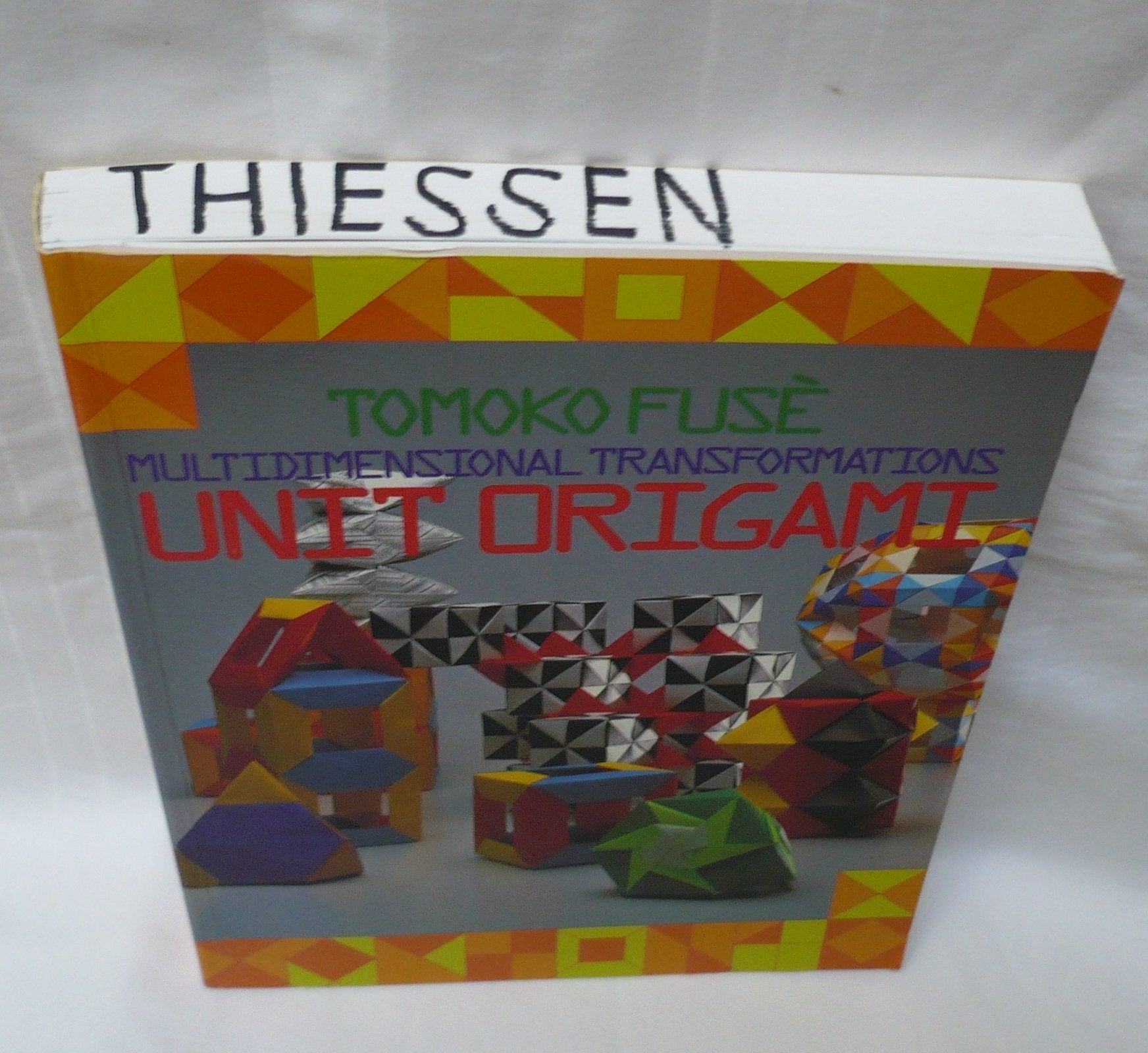 Unit Origami: Multidimensional Transformations