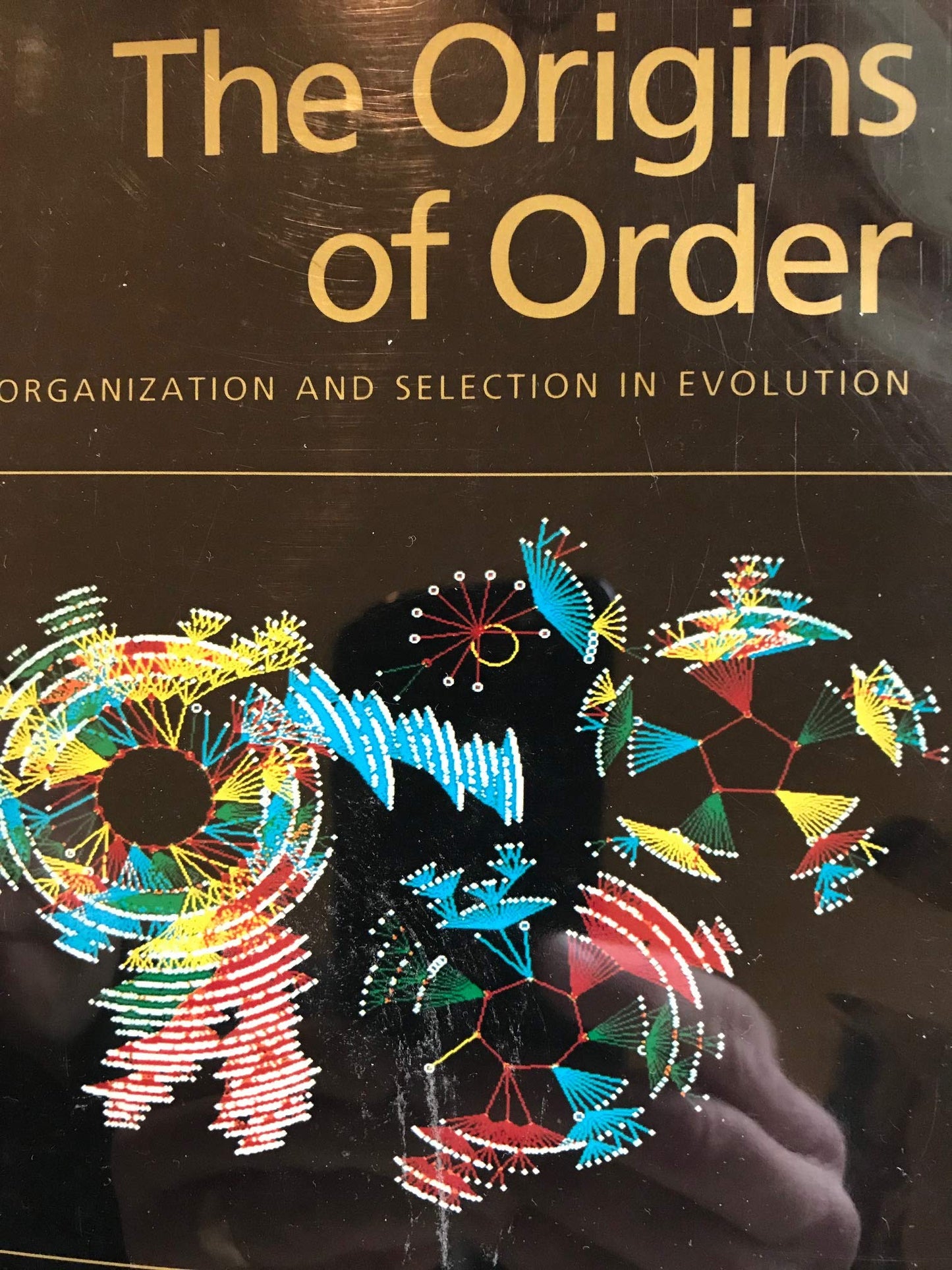 The Origins of Order: Self-Organization and Selection in Evo