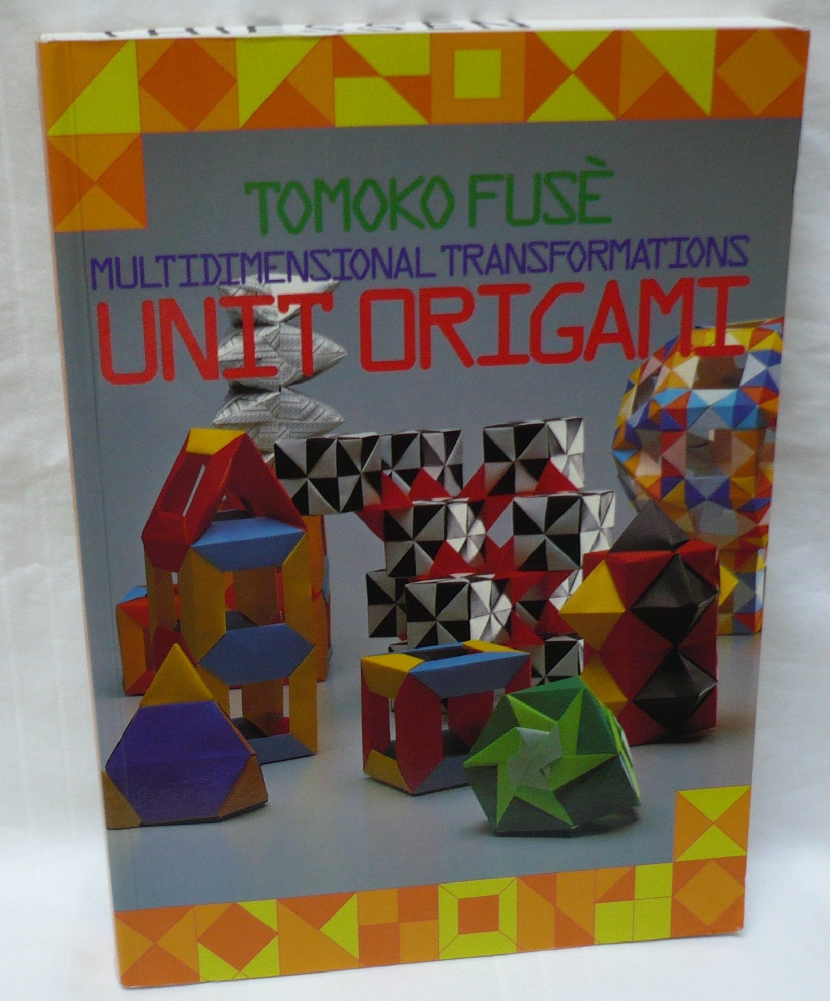 Unit Origami: Multidimensional Transformations