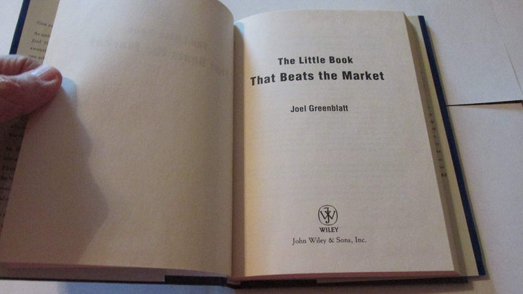 The Little Book That Beats the Market — back cover