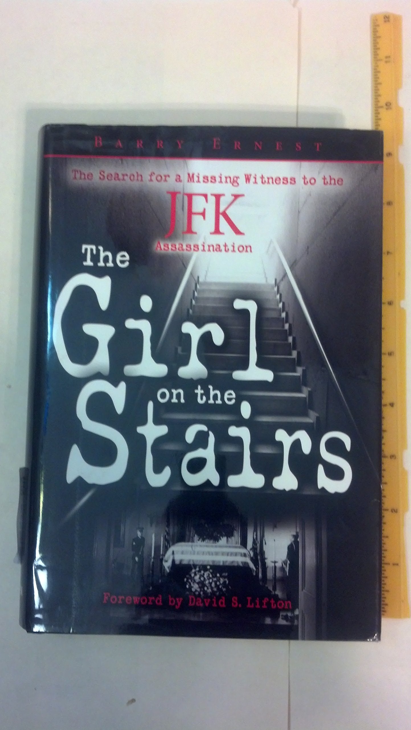 Girl on the Stairs, The: The Search for a Missing Witness to