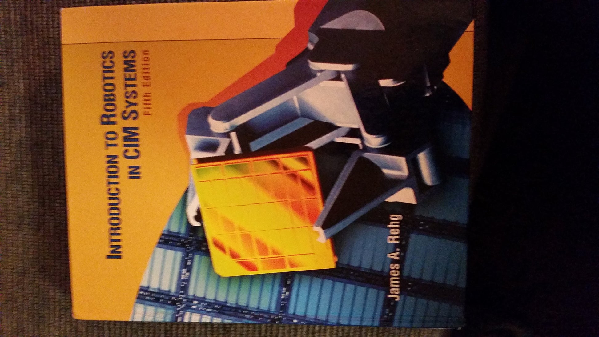 Introduction to Robotics in CIM Systems (5th Edition)