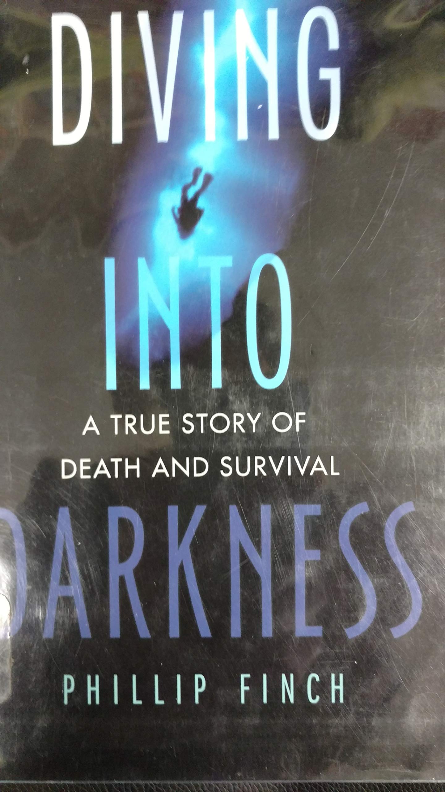Diving into Darkness: A True Story of Death and Survival by