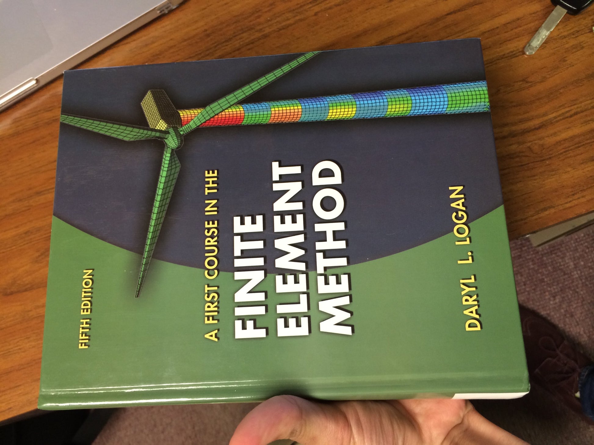 A First Course in the Finite Element Method