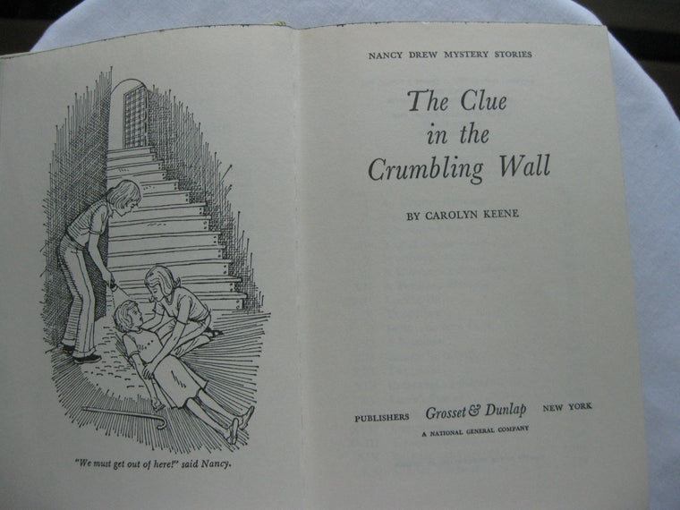 The Clue in the Crumbling Wall (Nancy Drew, Book 22) — back cover