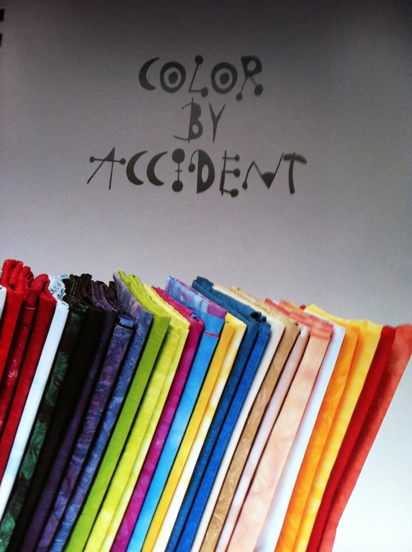 Color by Accident: Low-Water Immersion Dyeing
